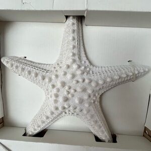 White starfish wall art from Hobby Lobby.